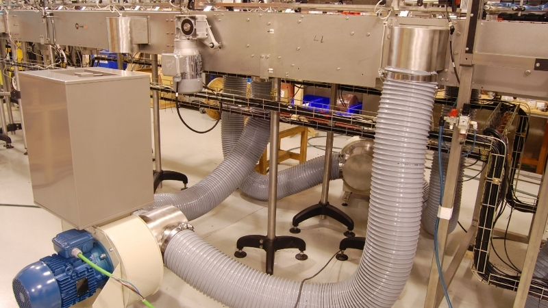 Băng tải chân không là gì?