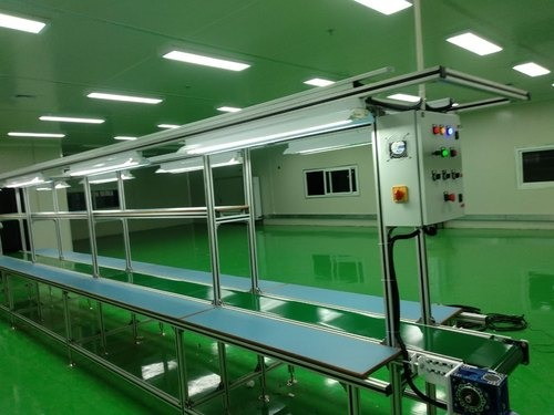 Electronic component assembly conveyor system